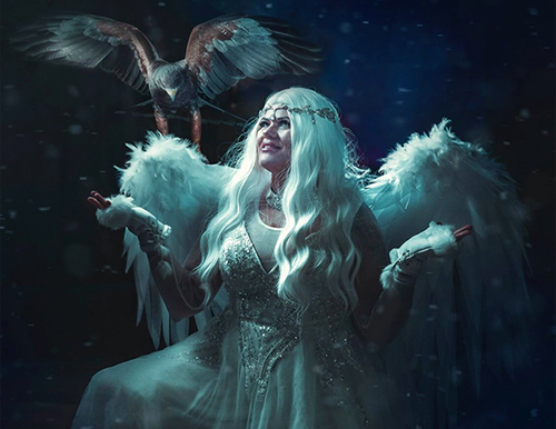 angel woman with hawk and wings