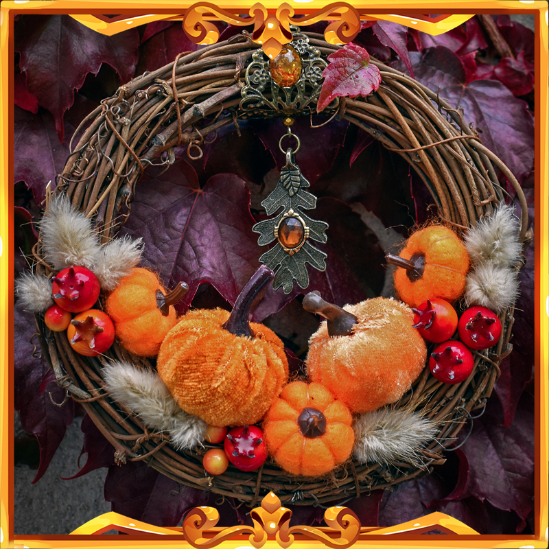 Halloween wreath featuring small felt pumpkins